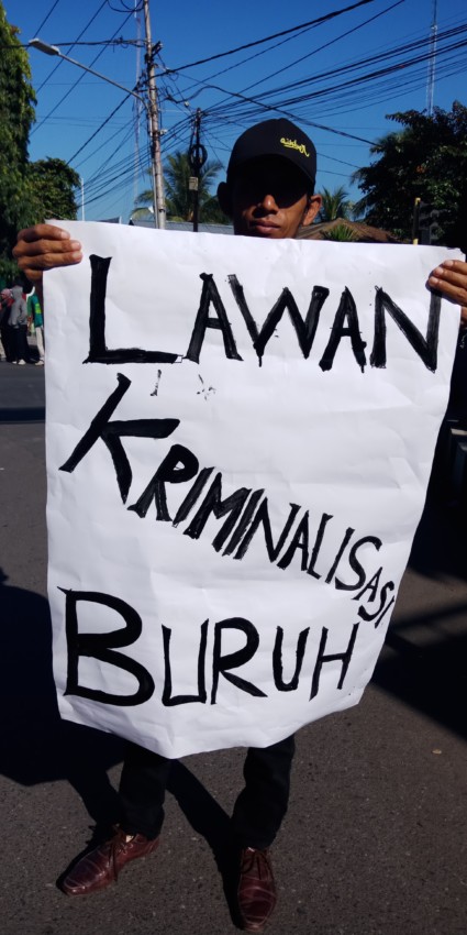 buruh dompu melawan