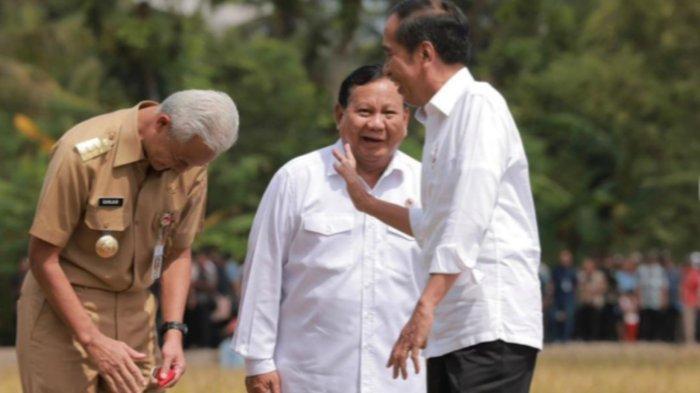 đź“· Prabowo (tengah), Ganjar (jonglok), dan Jokowi. (Tribunnews).